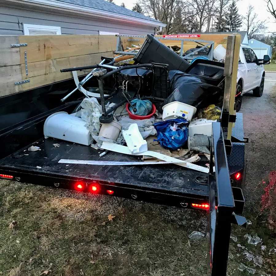 Roll-off dumpster delivered to a residential driveway in Three Points
